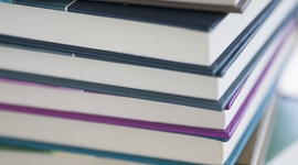 EB RI Publications - stack of books